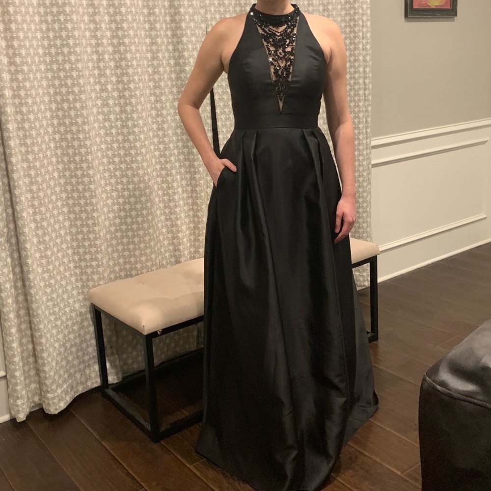 Black ball gown with beaded illusion neckline